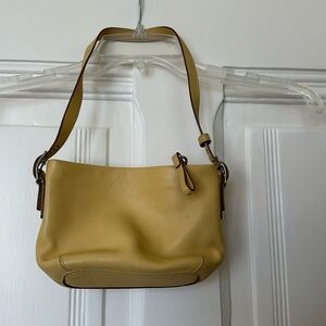 Coach butter yellow leather mini-bag.